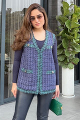 Nikita Vasdev In Our Purple and Green Sleeveless Jacket