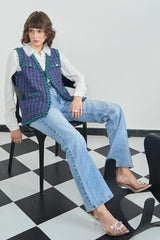 Nikita Vasdev In Our Purple and Green Sleeveless Jacket